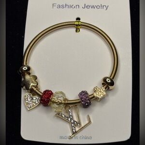 Fashion Jewelry Gold Tone Sparkling Heart
Charm Stretch Bracelet Red Purple